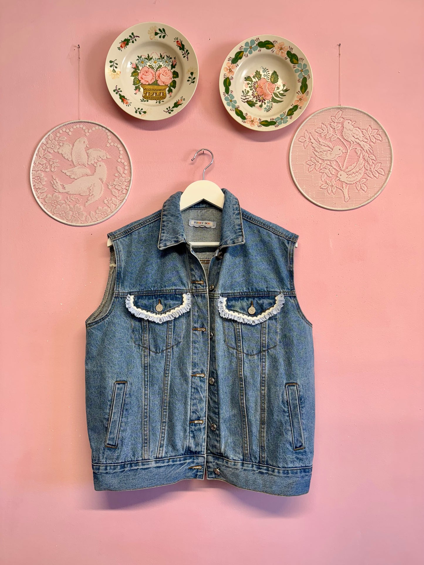 Jeans vest with flowers