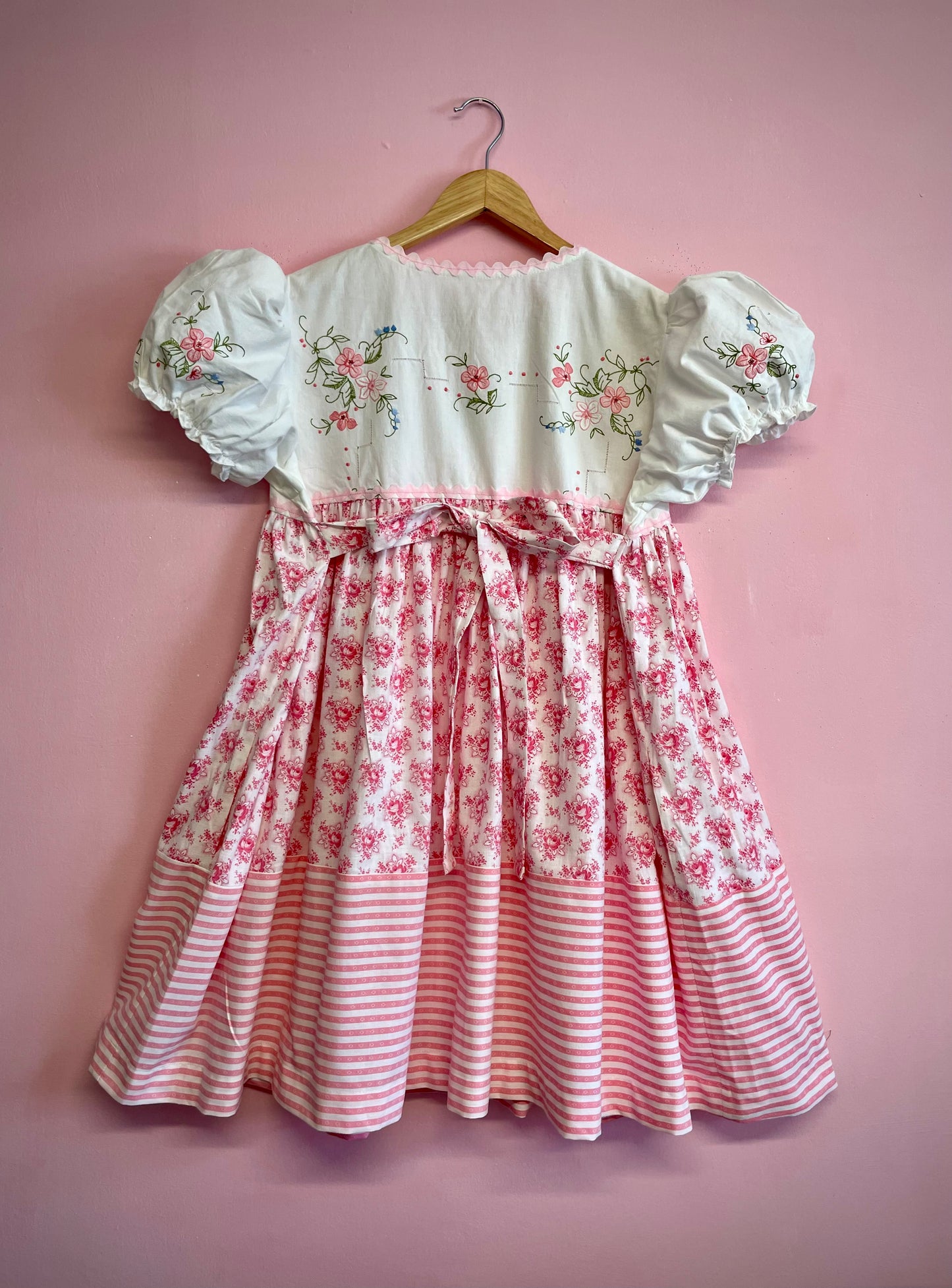 Dress with pink embroidery