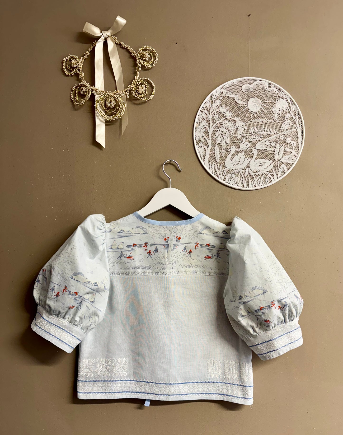 Blue blouse with handmade embroidery