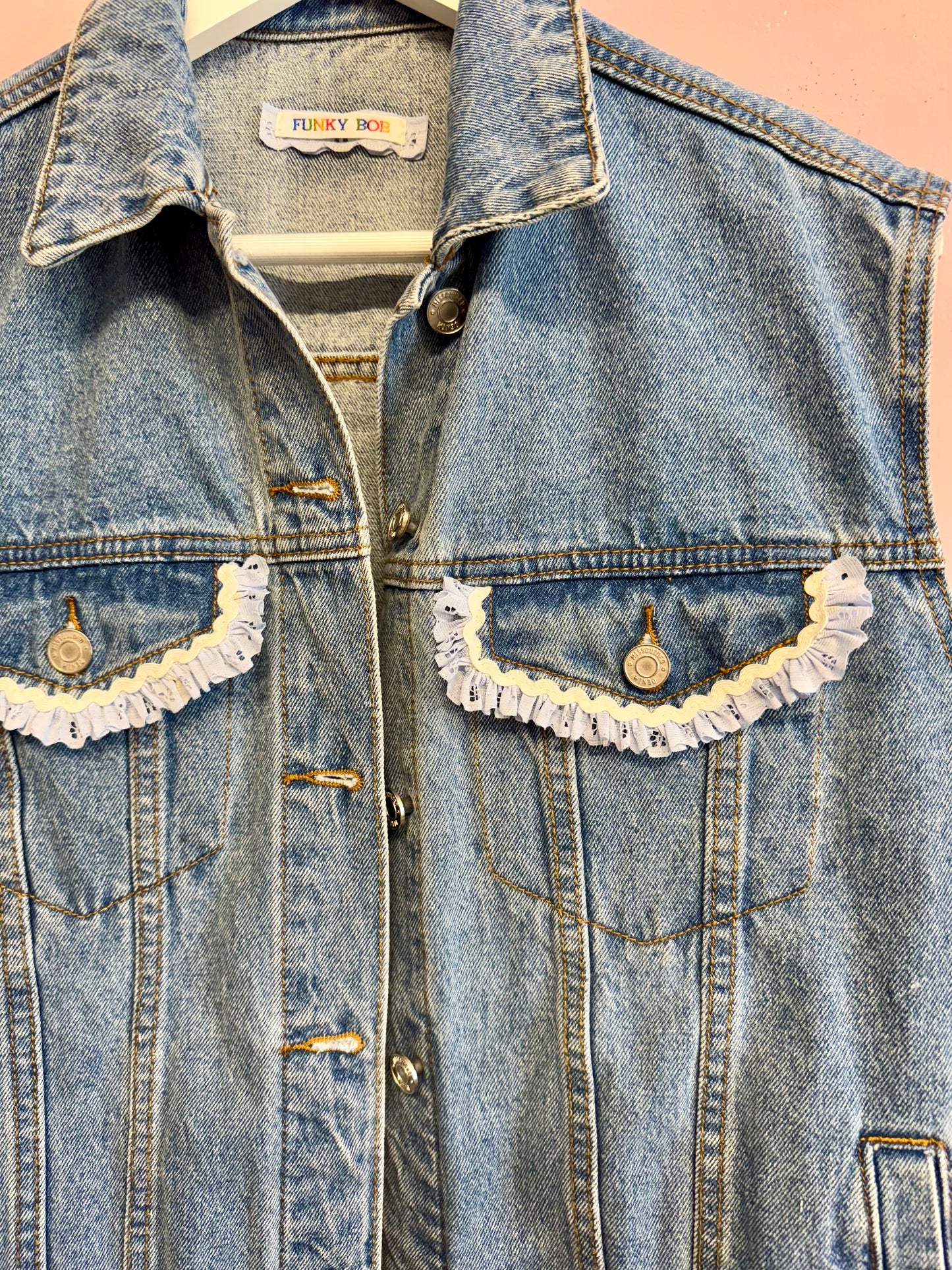 Jeans vest with flowers