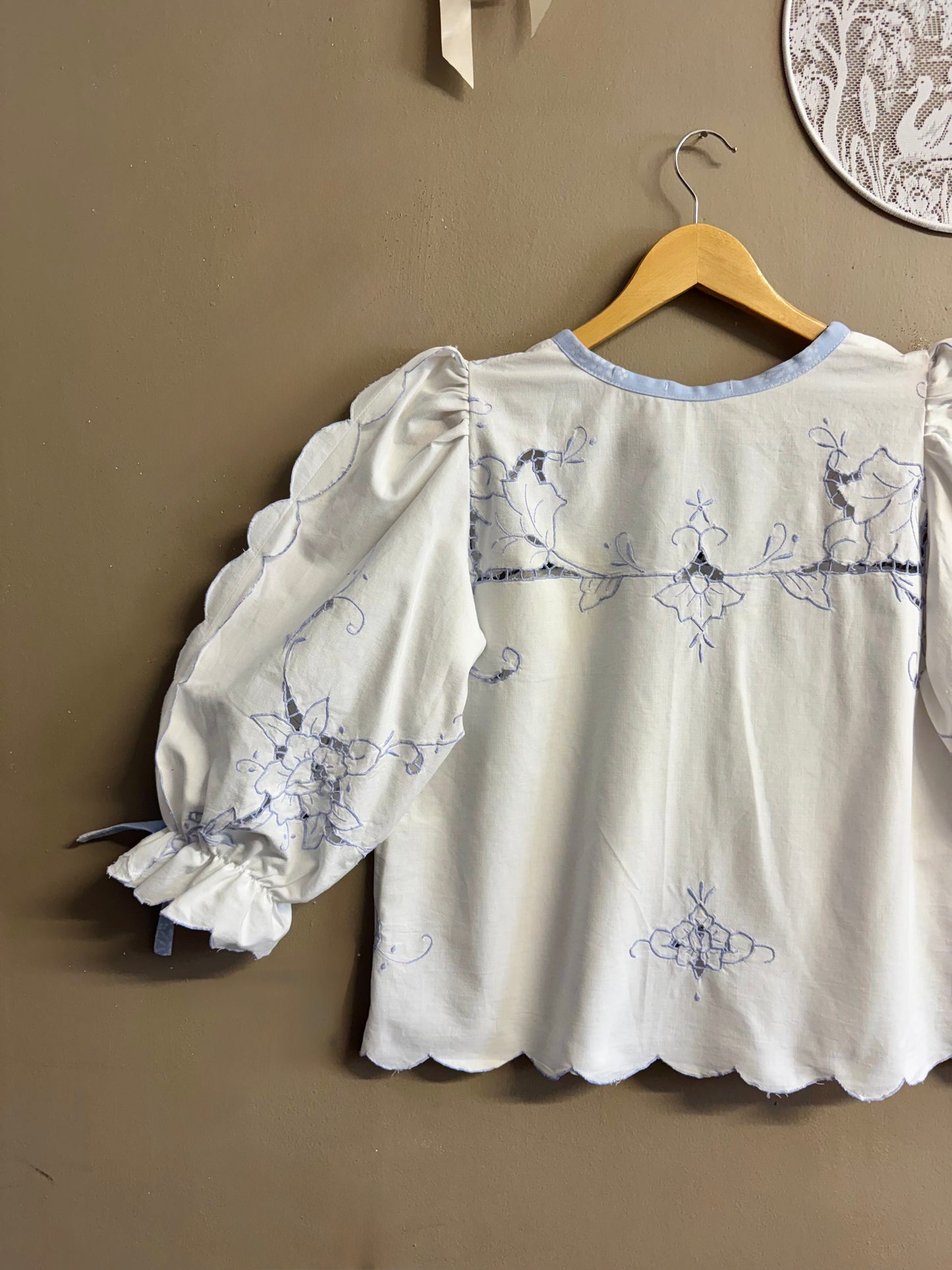 Blouse with blue embroidery