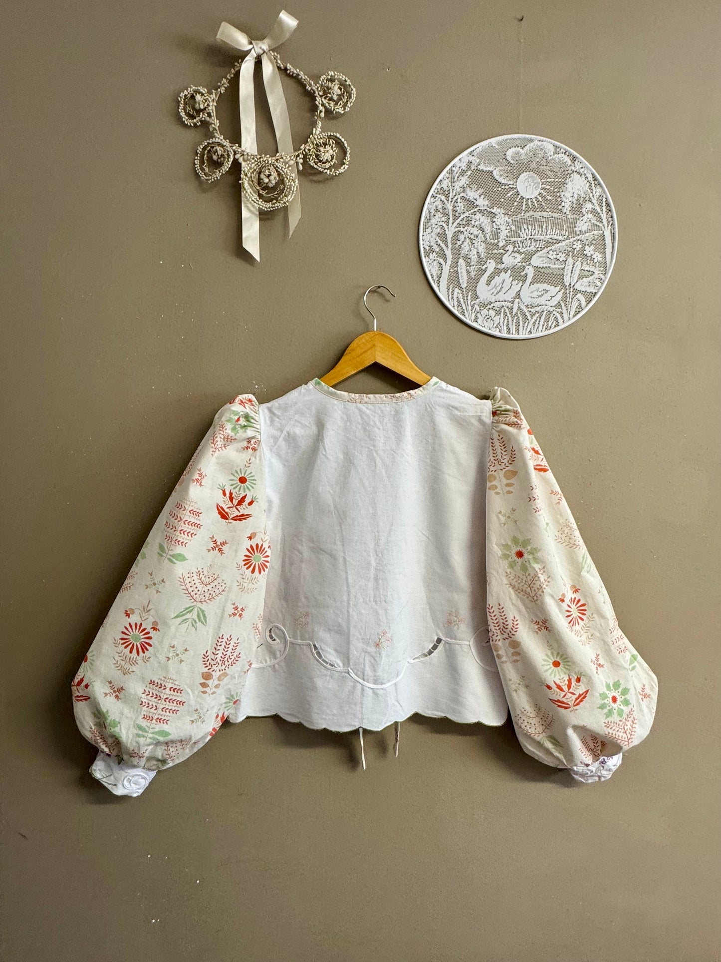 Beige blouse with embroidery