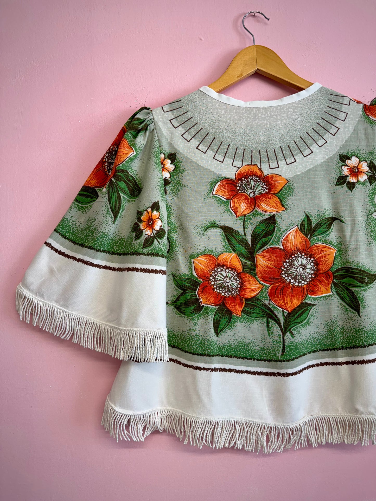Blouse with orange flowers