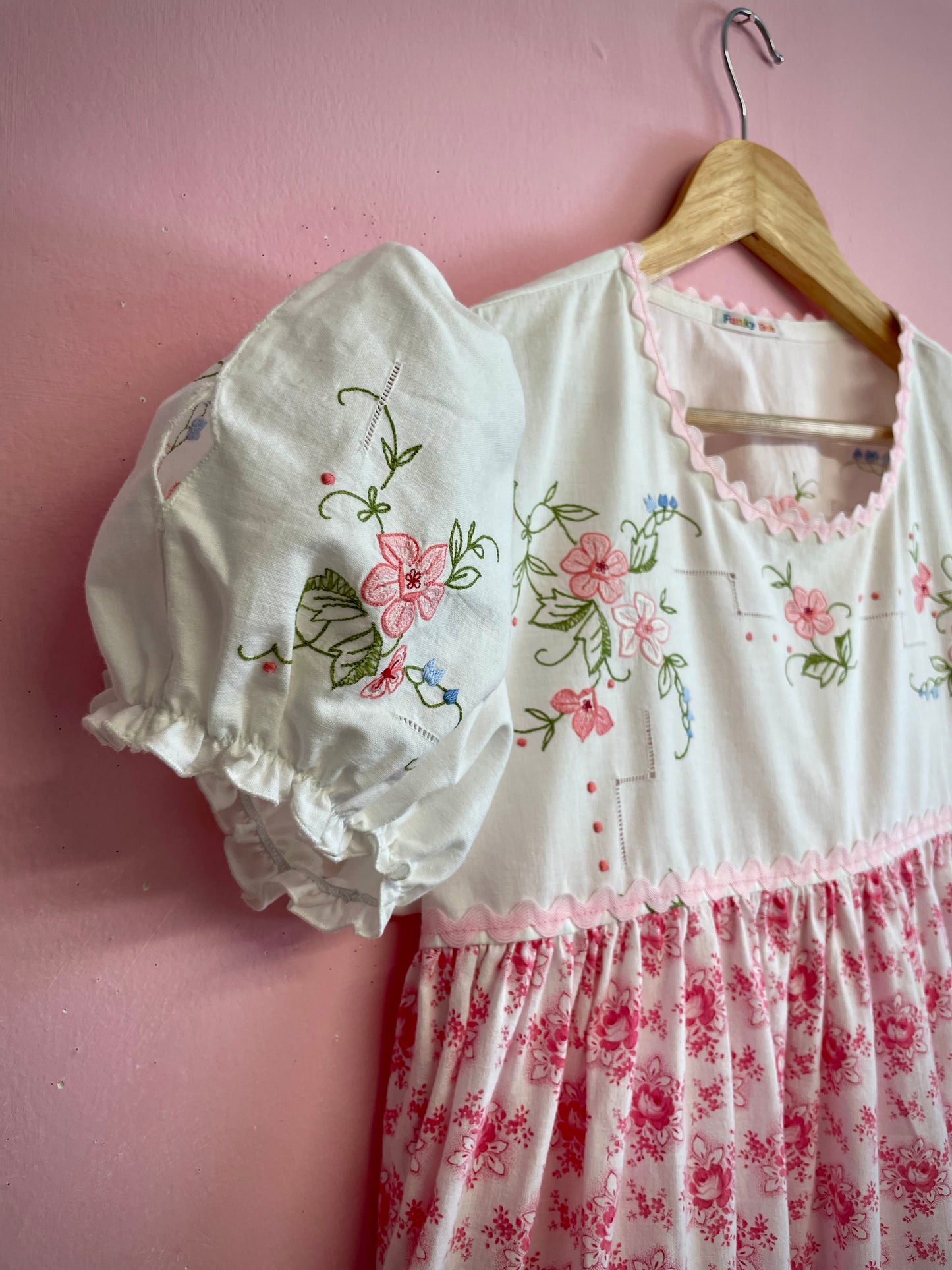 Dress with pink embroidery