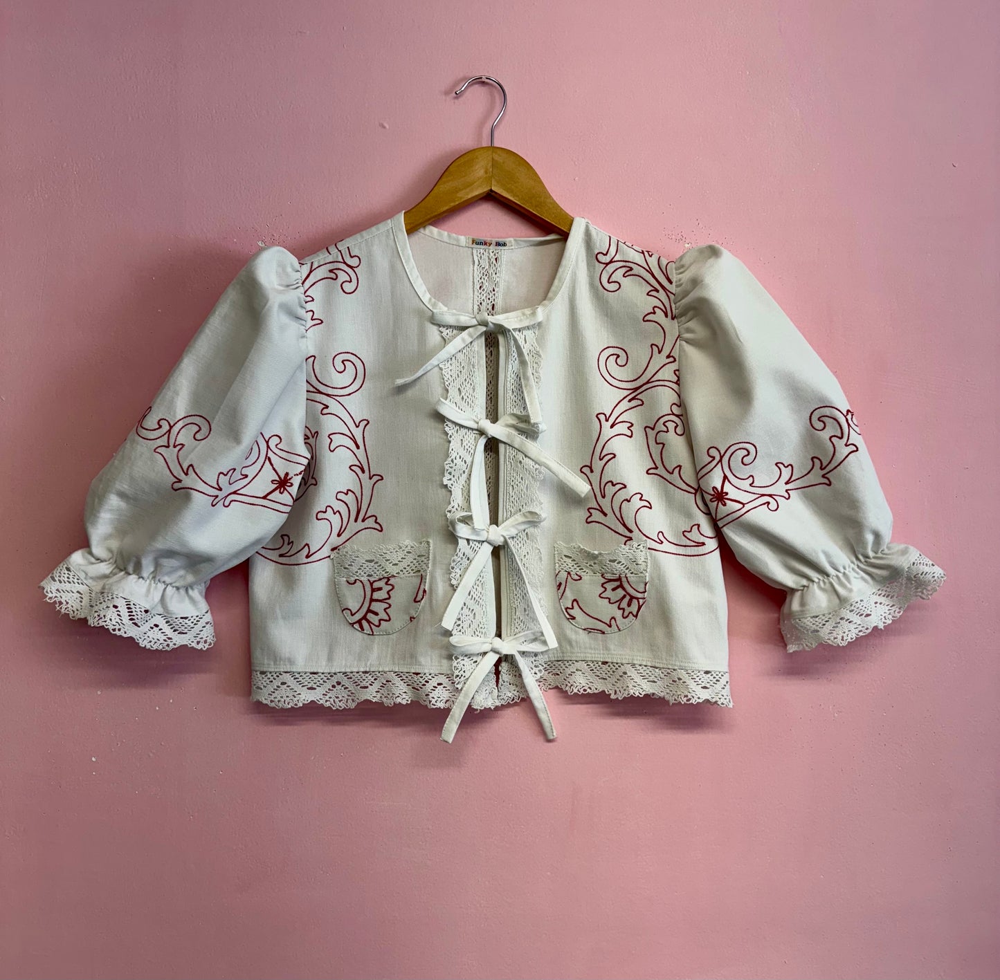 Twinset with red embroidery
