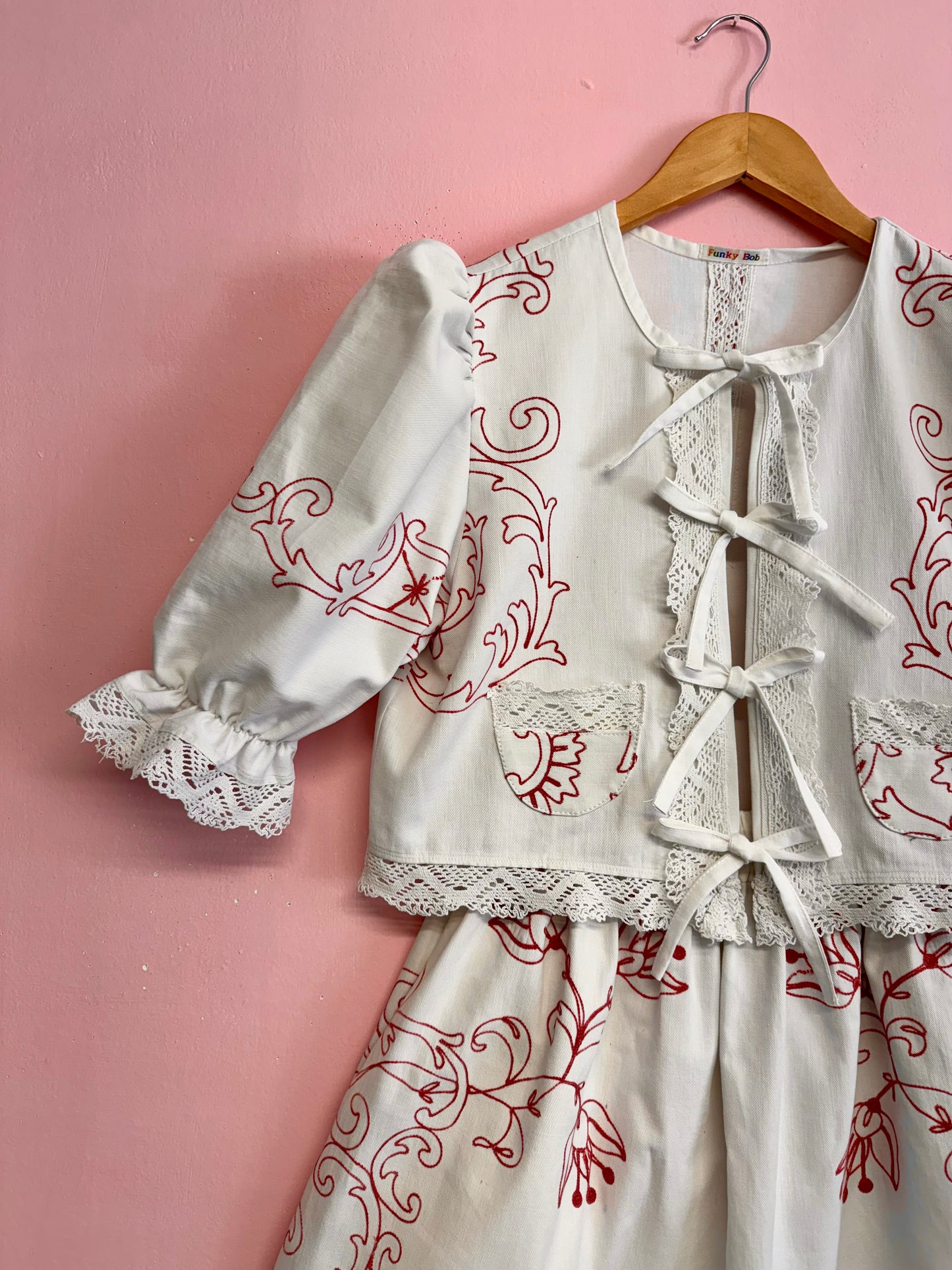 Twinset with red embroidery