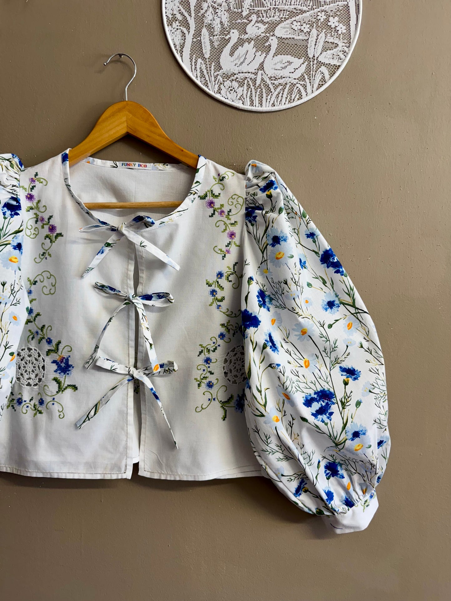 Blouse with flowers and embroidery