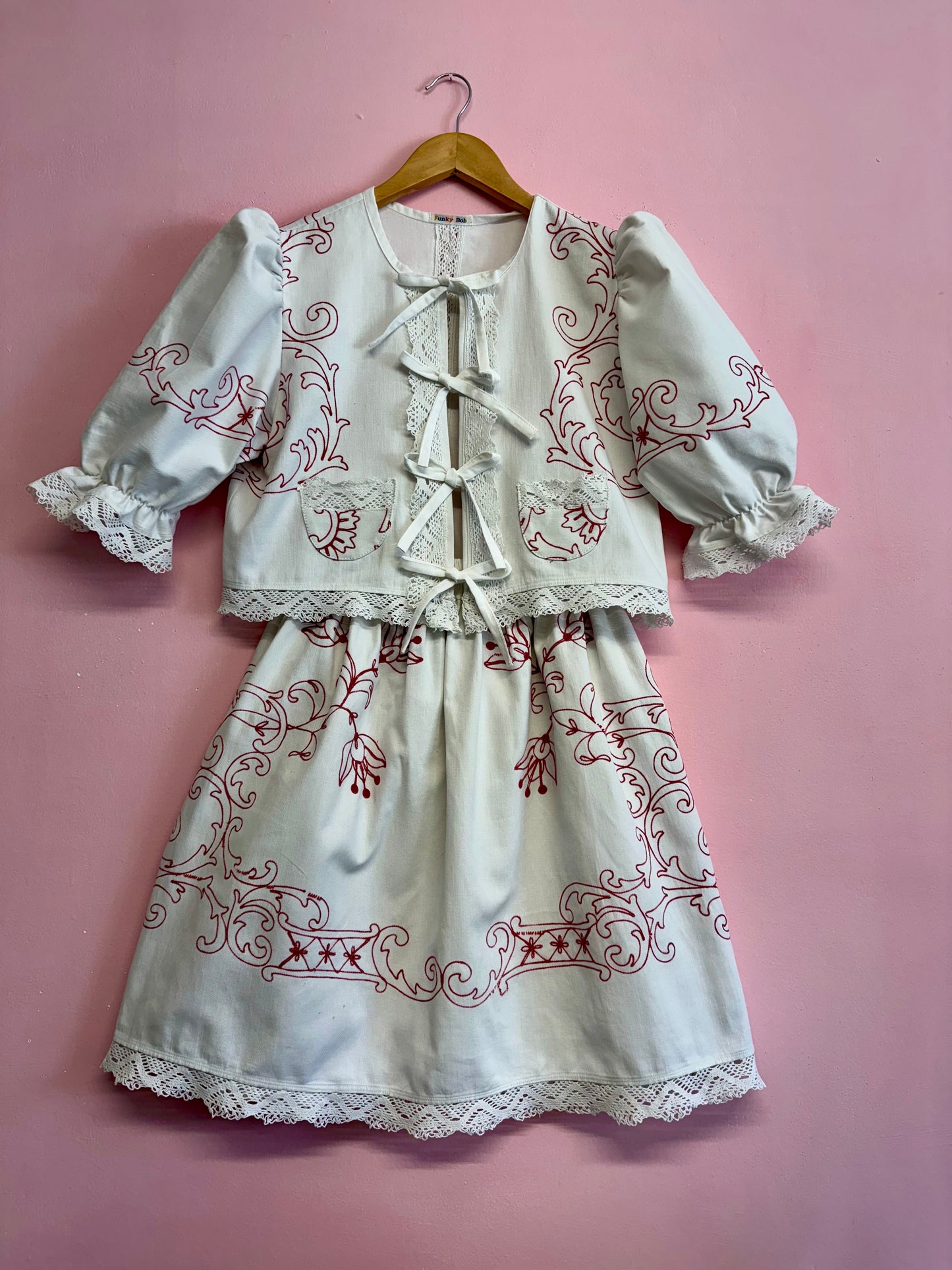 Twinset with red embroidery