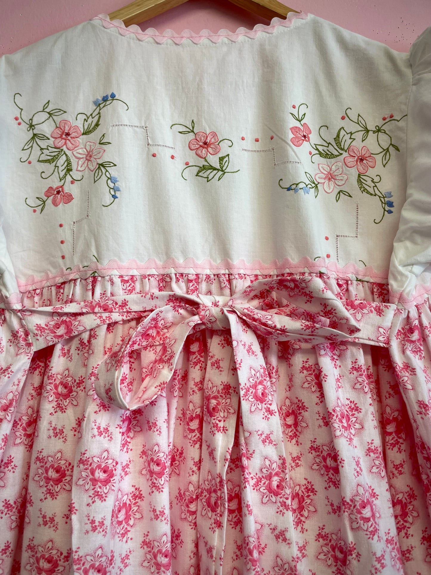 Dress with pink embroidery