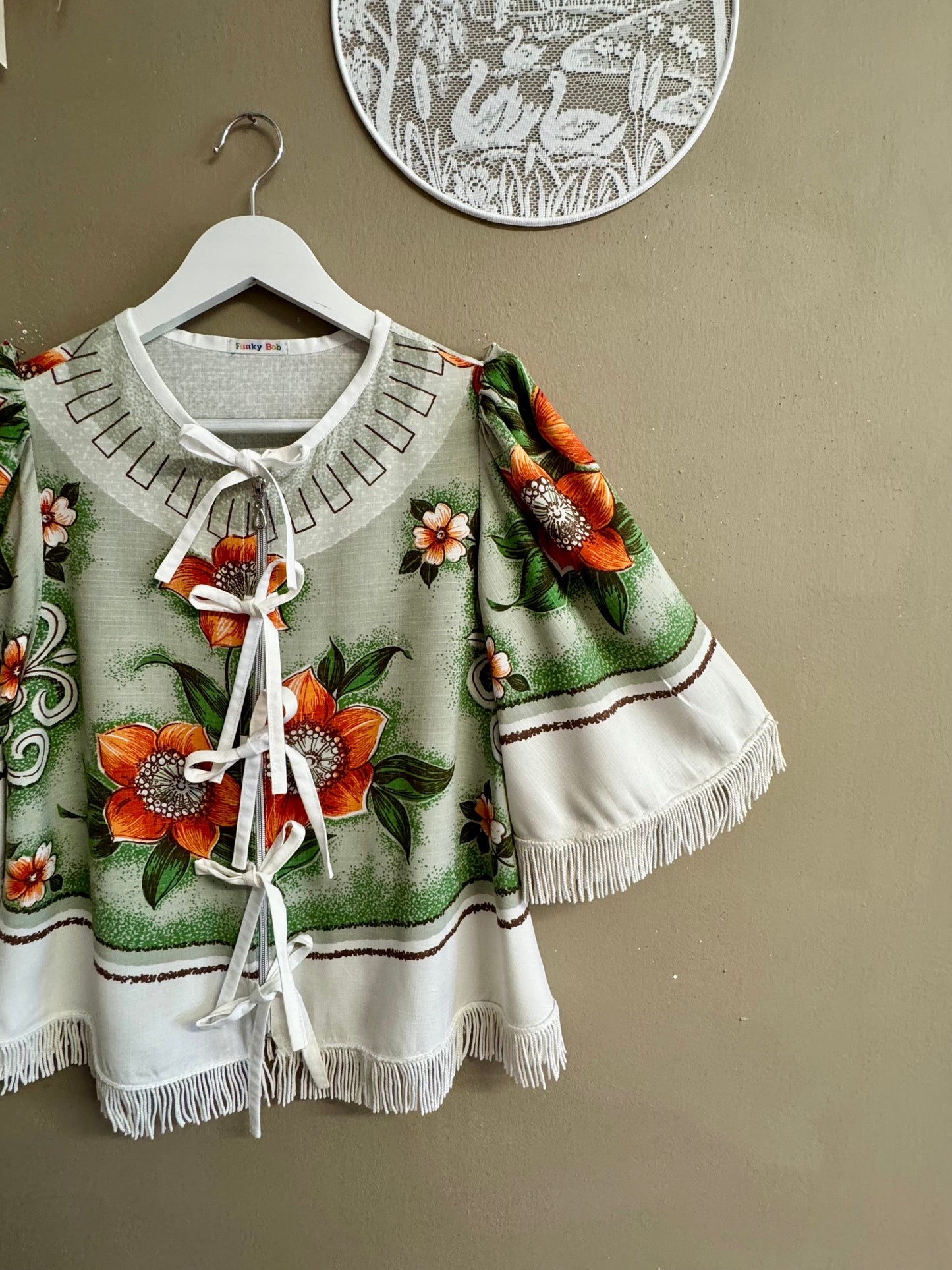 Blouse with orange flowers