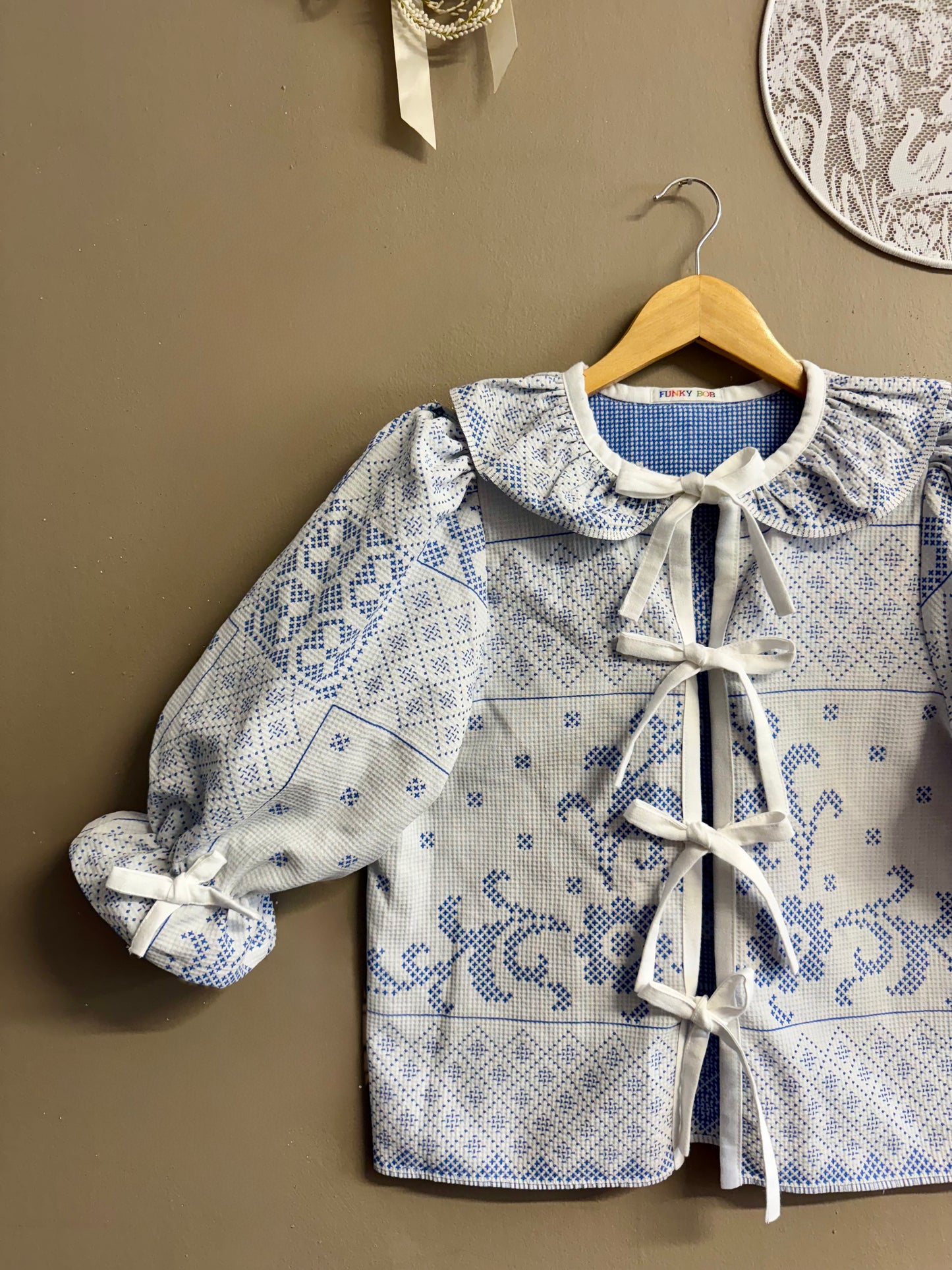 Blouse with blue embroidery