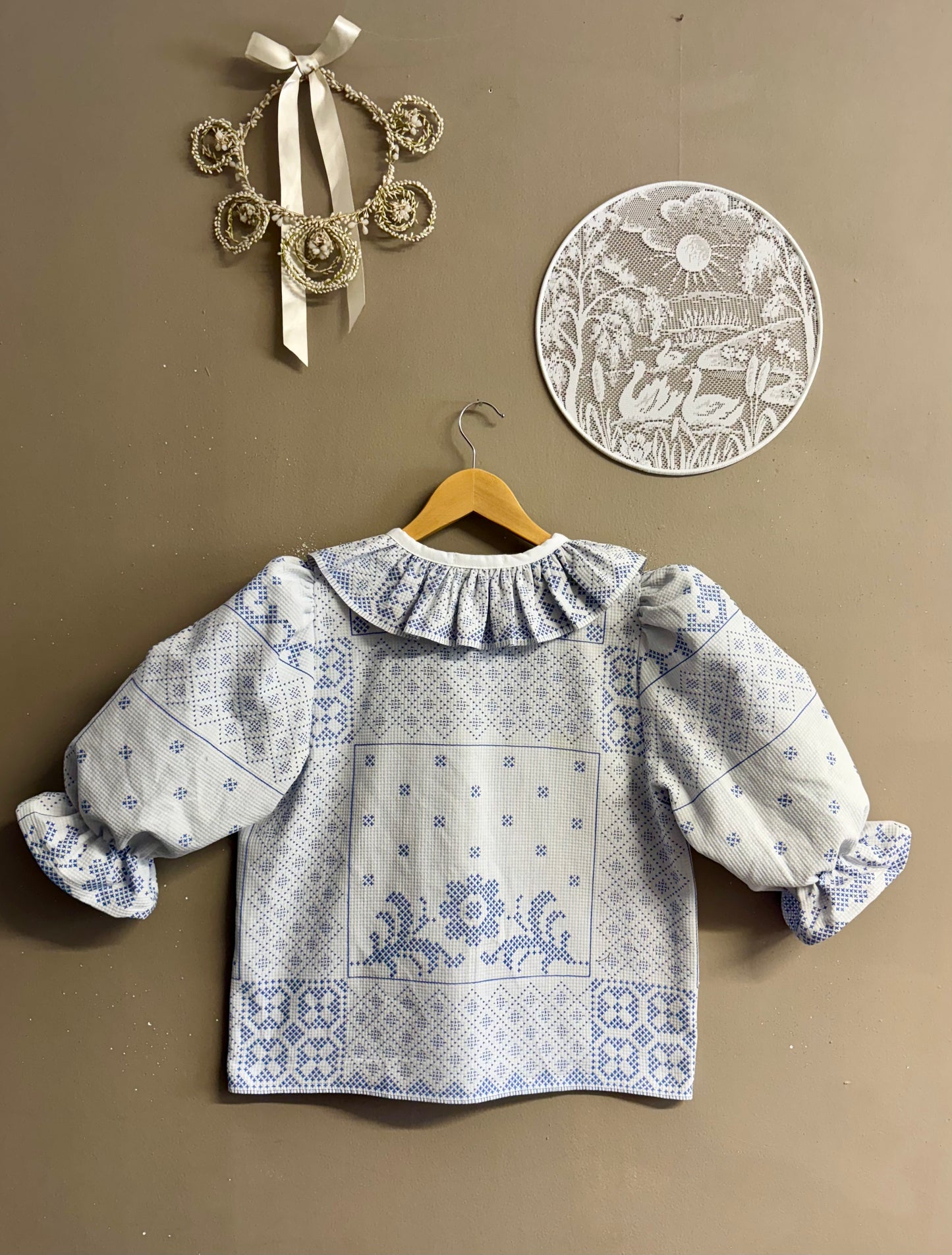 Blouse with blue embroidery