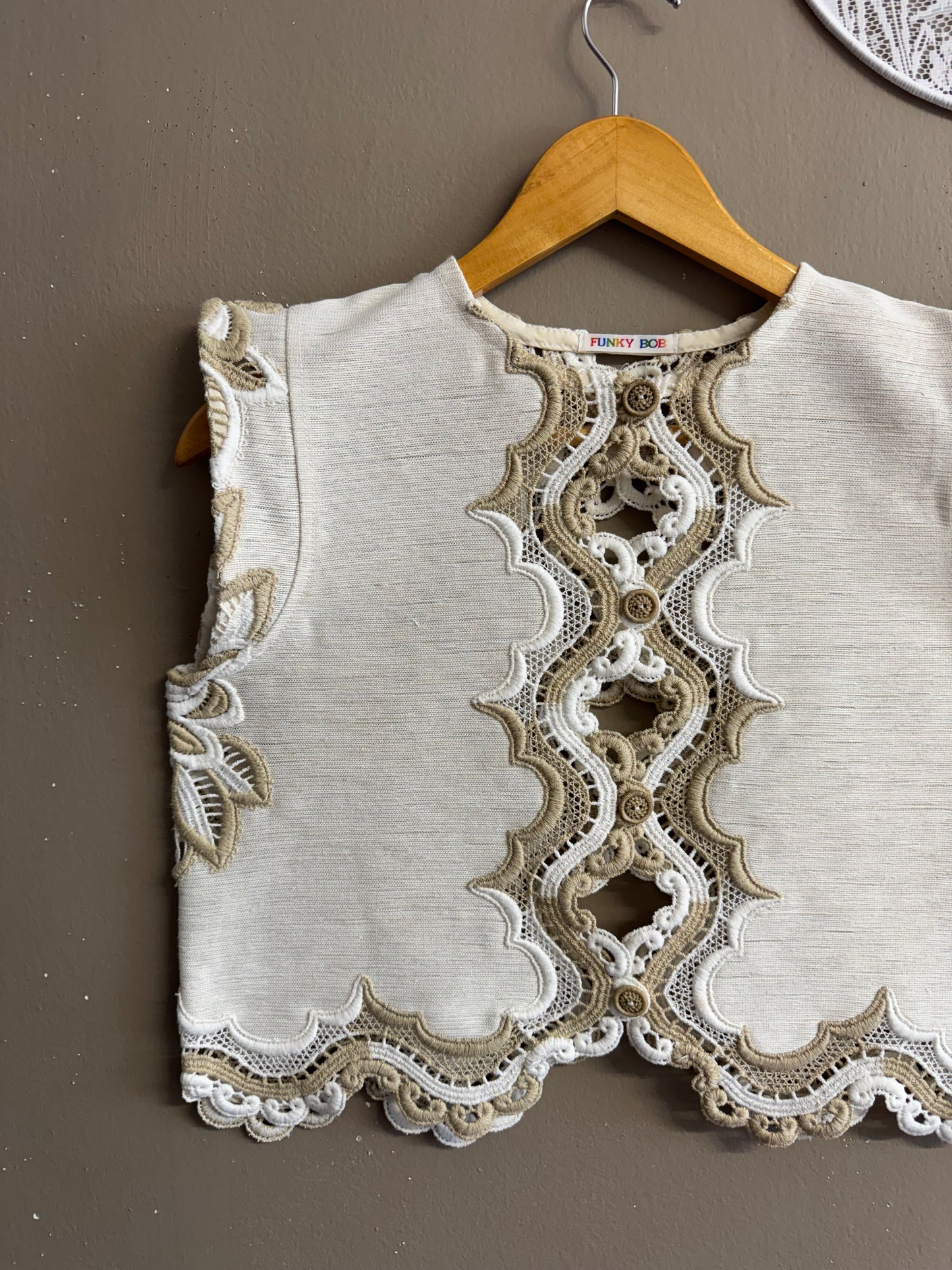 Blouse with beige embroidery