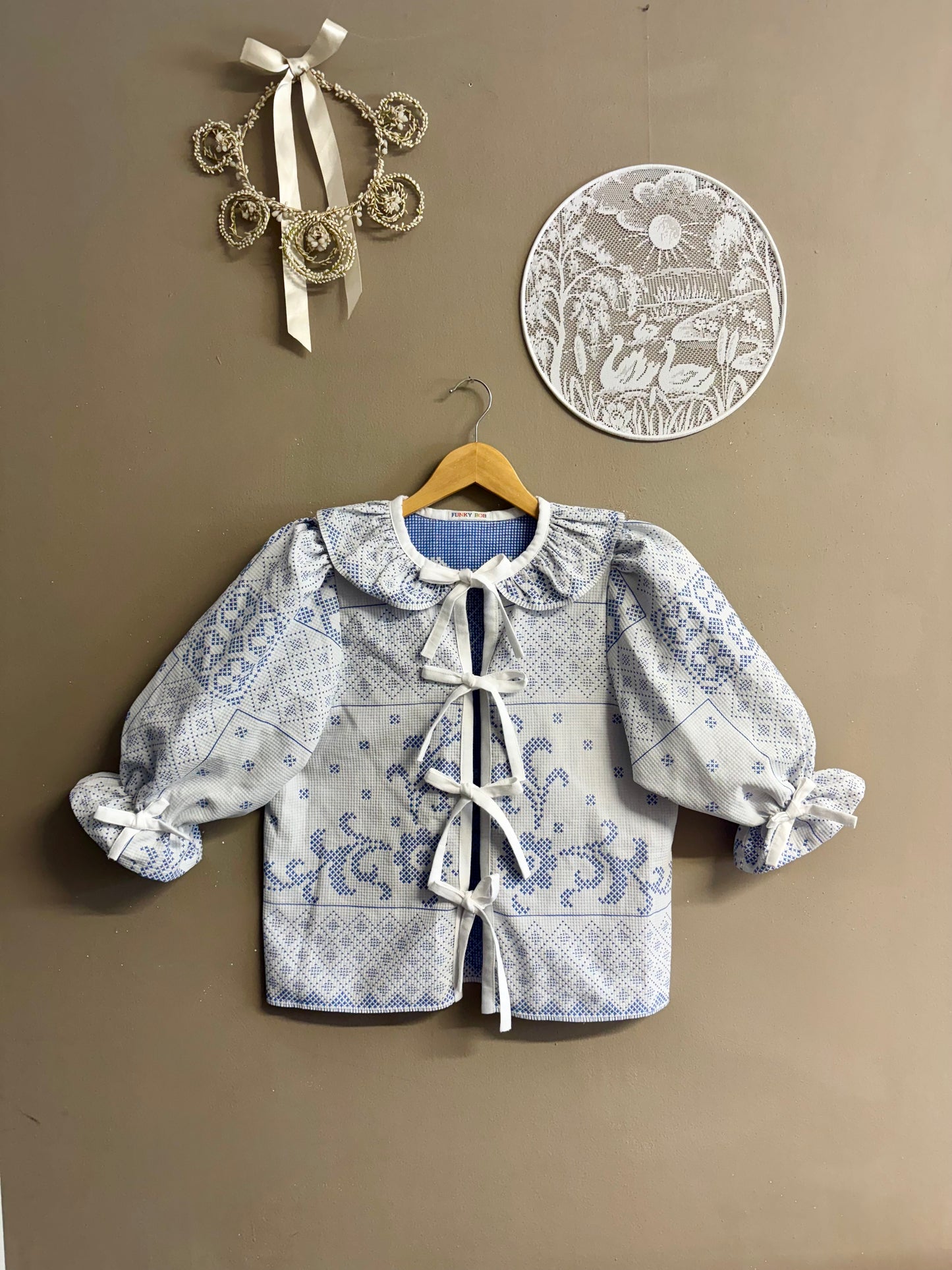 Blouse with blue embroidery