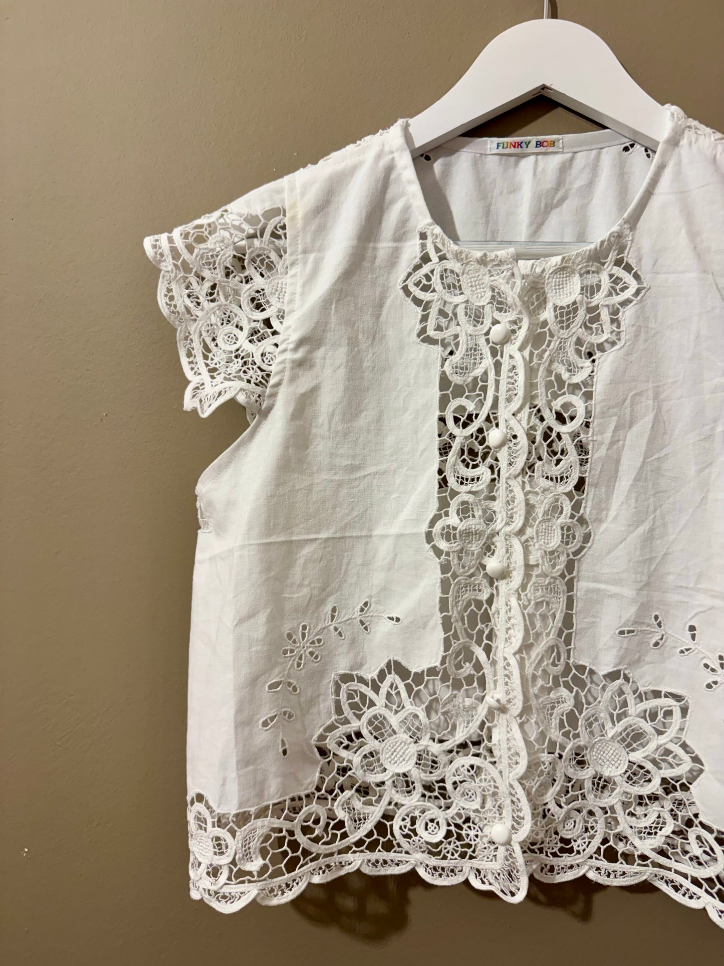 Blouse with delicate embroidery