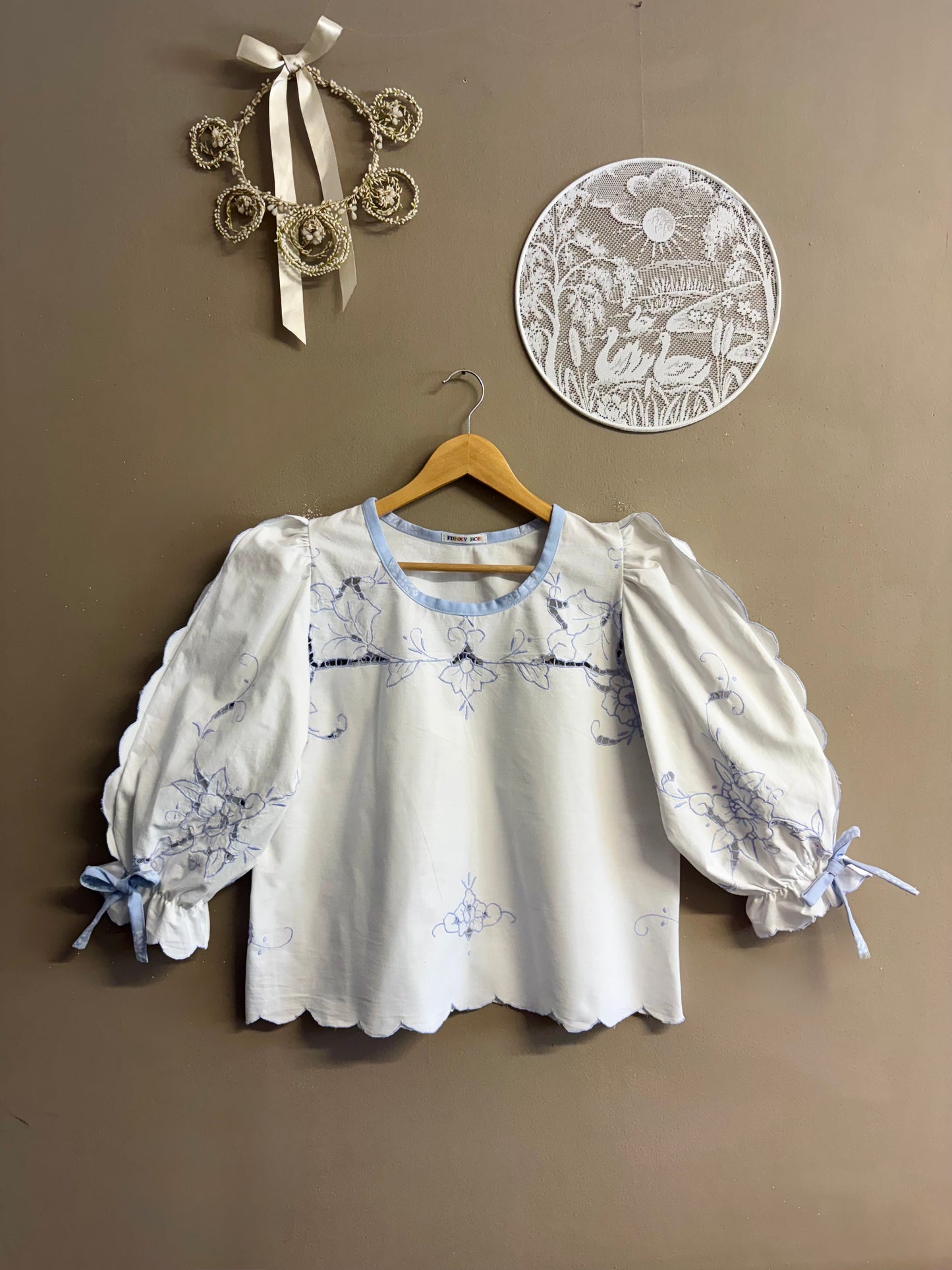 Blouse with blue embroidery