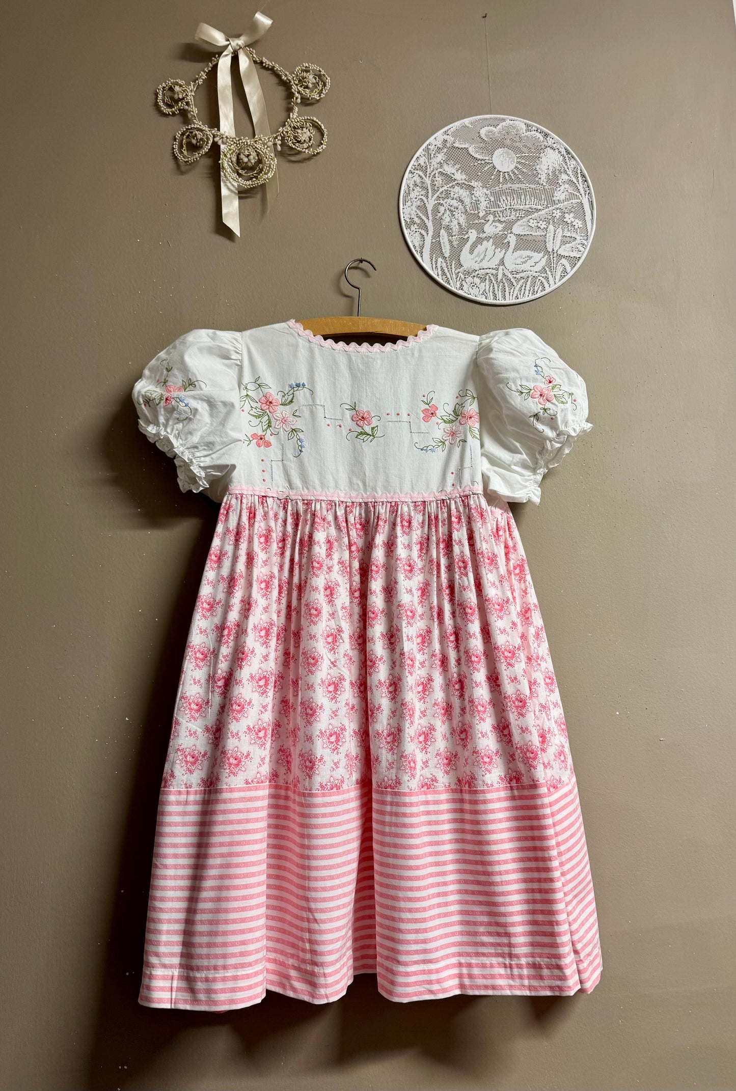 Dress with pink embroidery