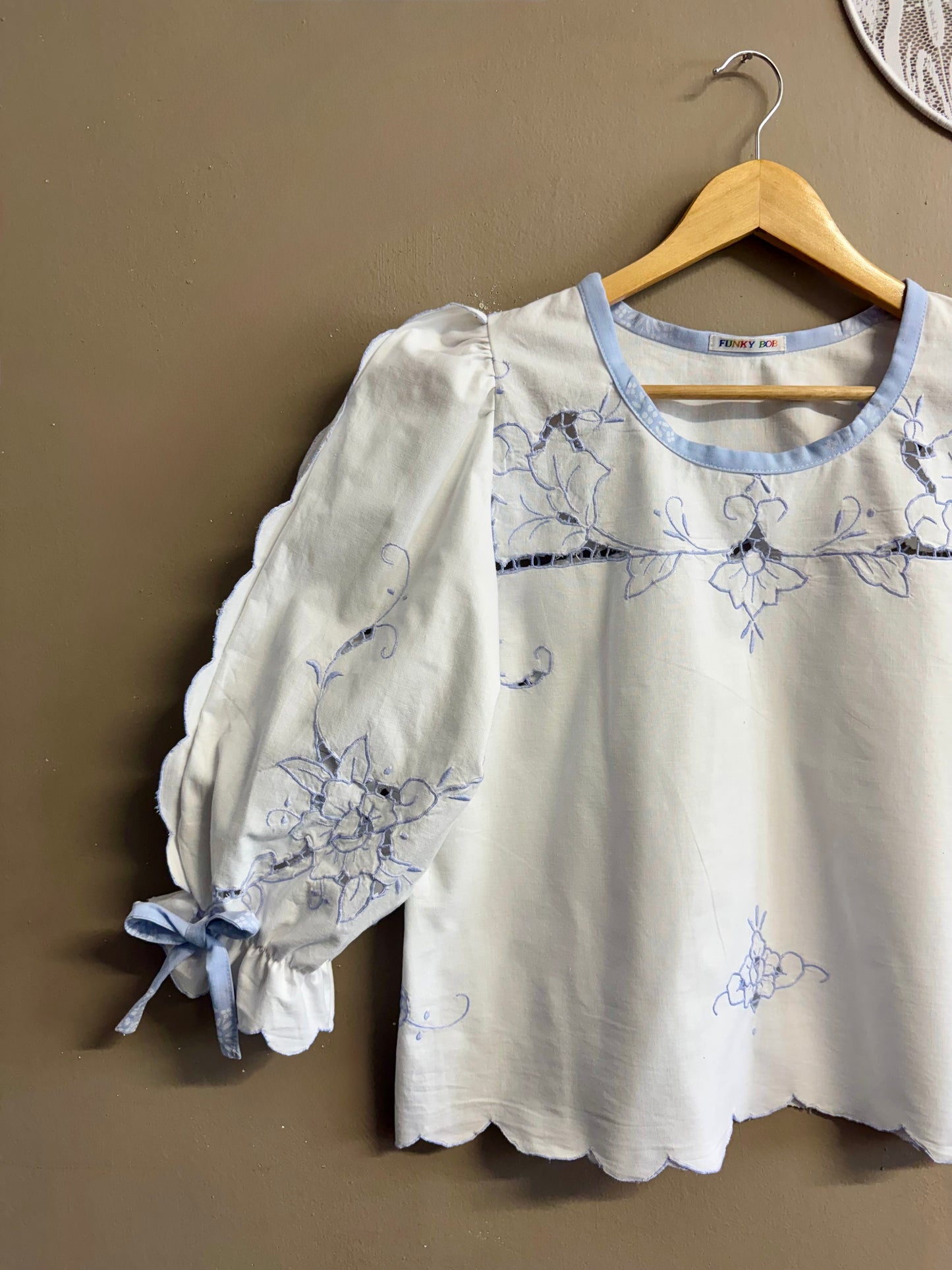 Blouse with blue embroidery