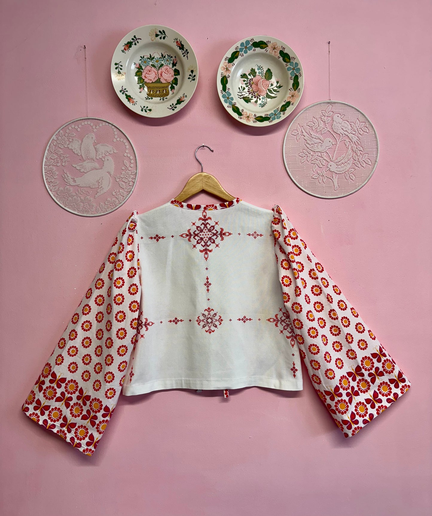 Blouse with red details and embroidery