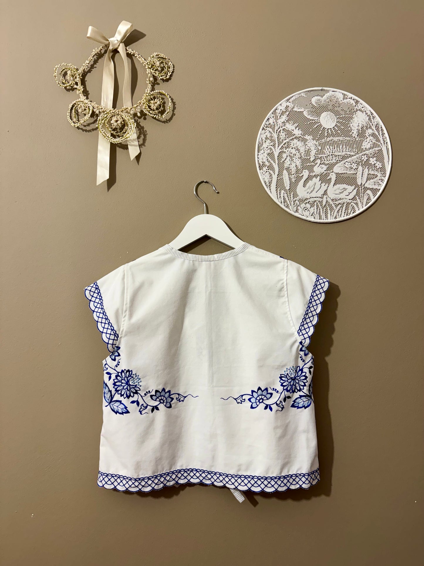 Blouse with blue embroidery