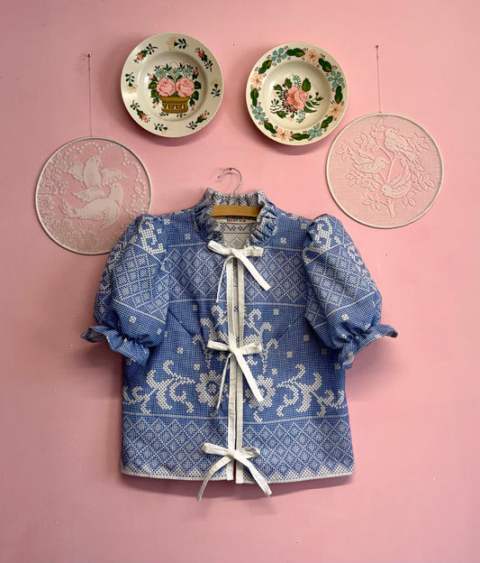 Blouse with blue embroidery