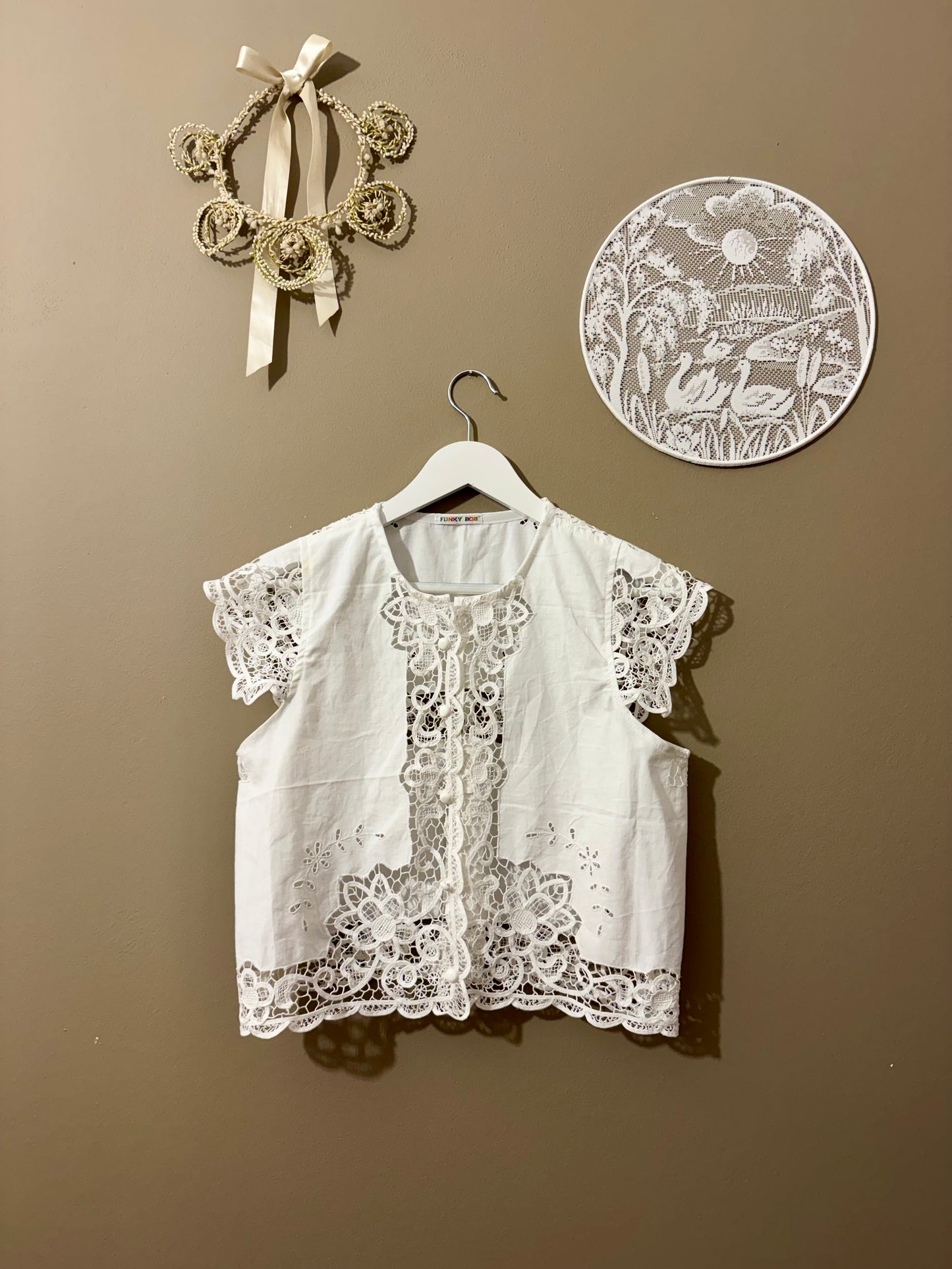 Blouse with delicate embroidery