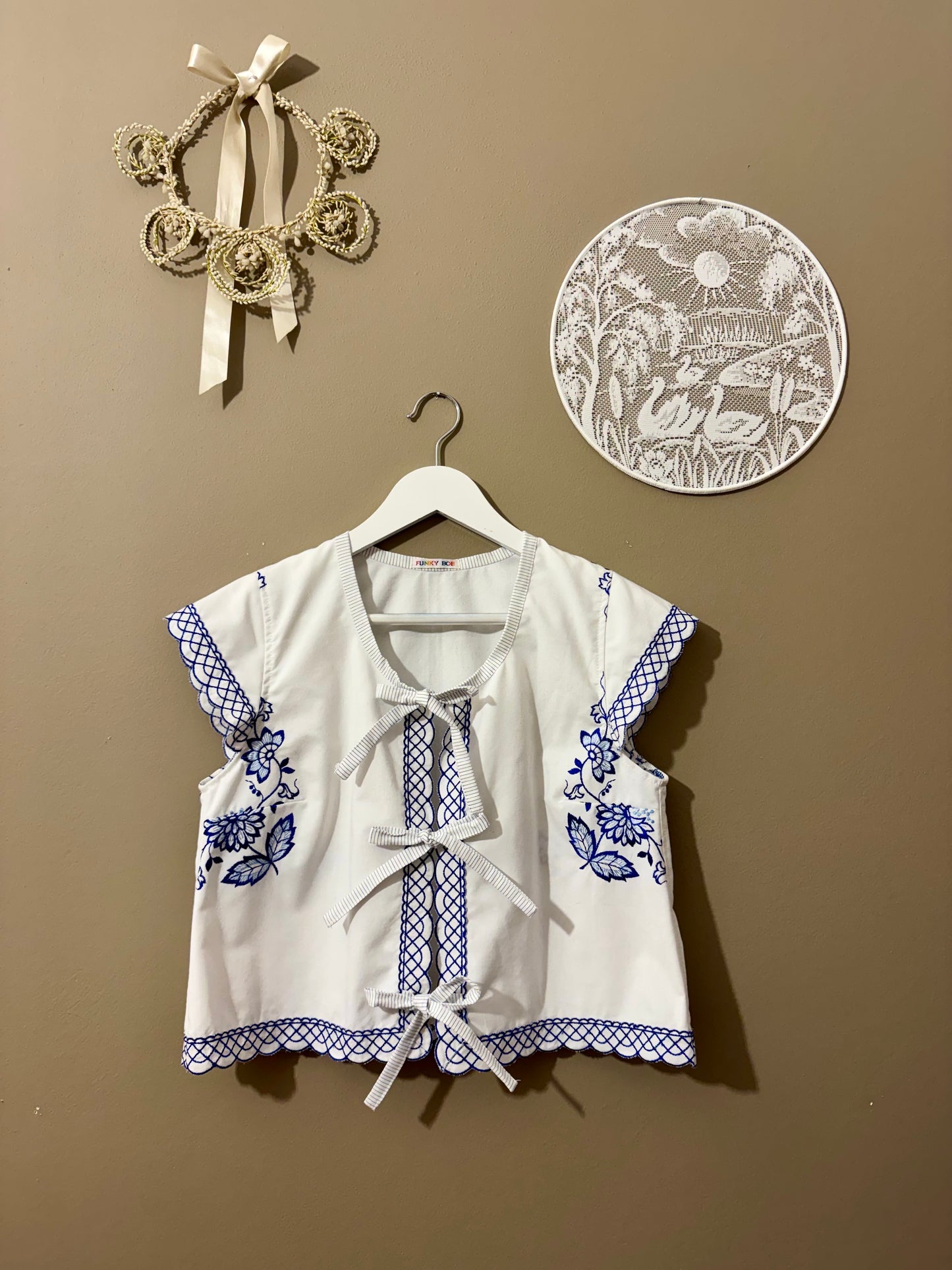 Blouse with blue embroidery