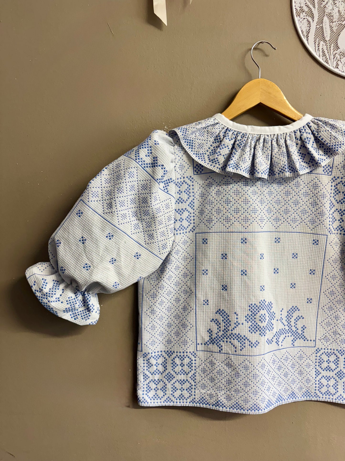 Blouse with blue embroidery