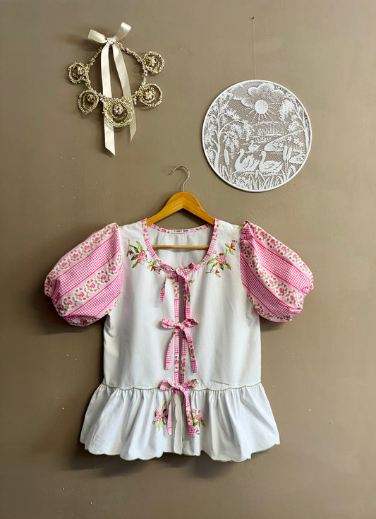 Blouse with pink sleeves
