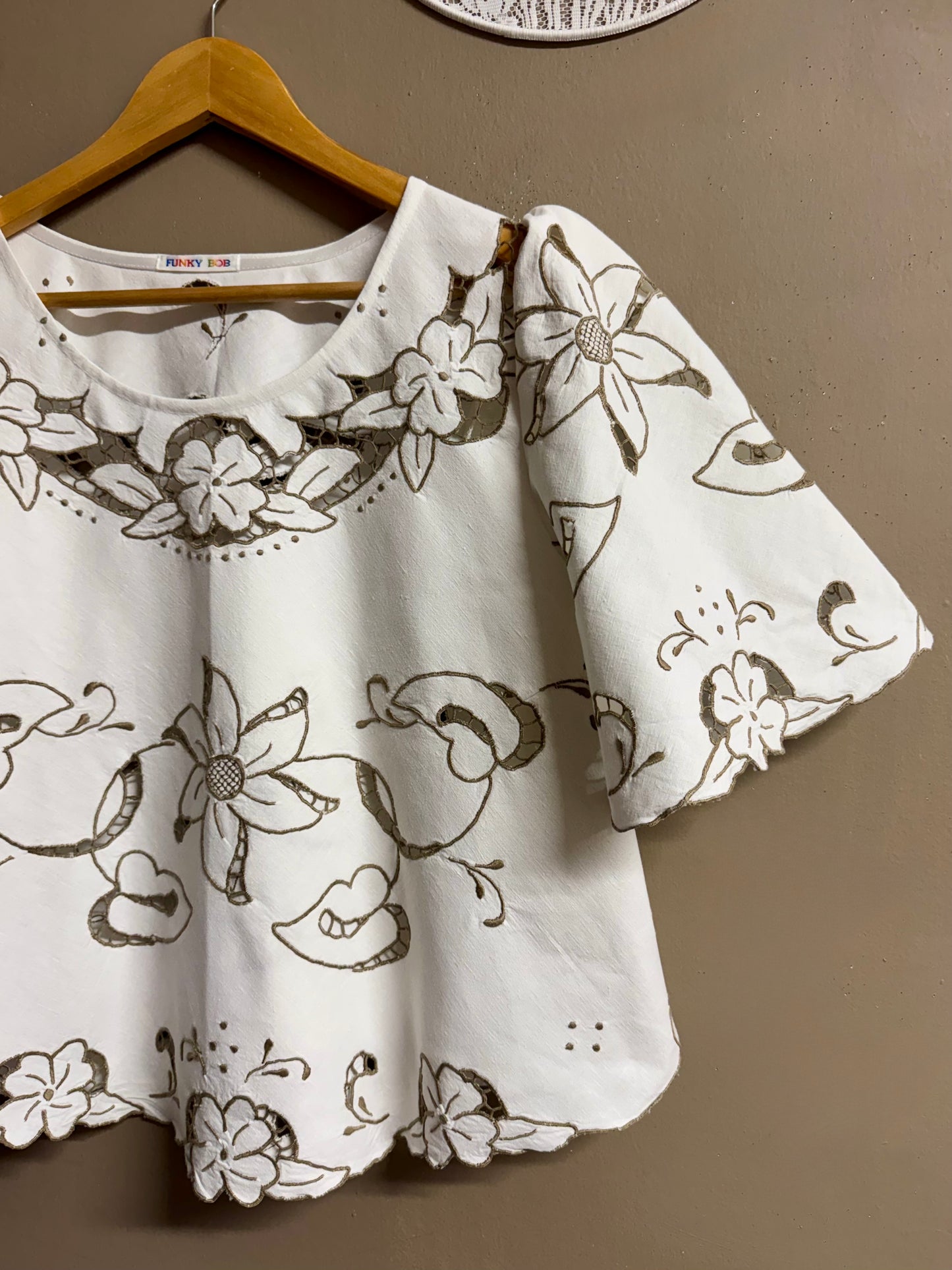 Blouse with grey embroidery