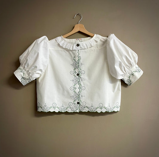 Blouse with green embroidery